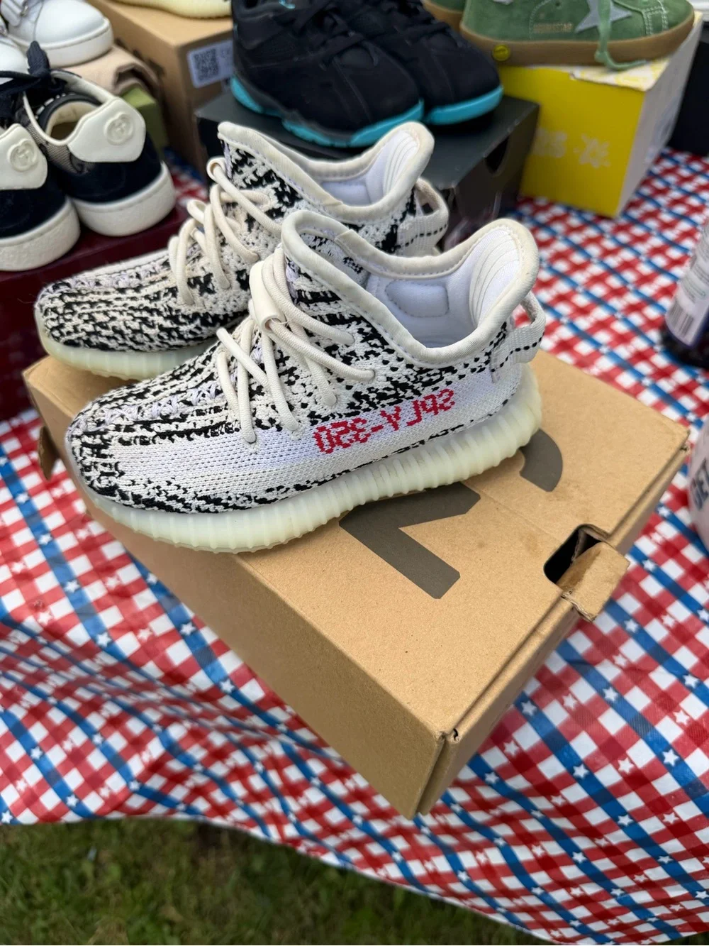Kids Black & White Knit Sneakers with Red Accent